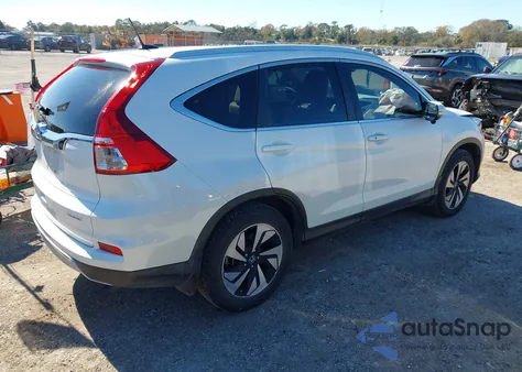 2016 Honda Cr-V Touring z USA, uszkodzony, nr VIN 5J6RM3H92GL018129